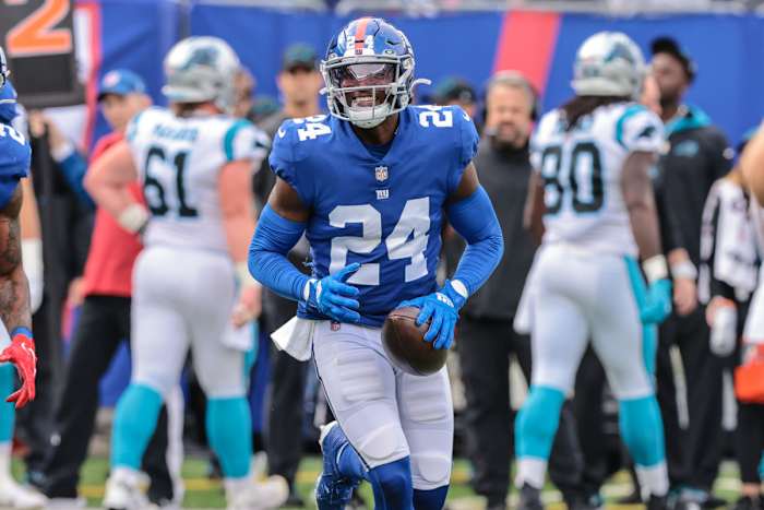 Oct 24, 2021; East Rutherford, New Jersey, USA; New York Giants cornerback James Bradberry (24) reacts after an interception against the Carolina Panthers during the first half at MetLife Stadium. Mandatory Credit: Vincent Carchietta-USA TODAY Sports